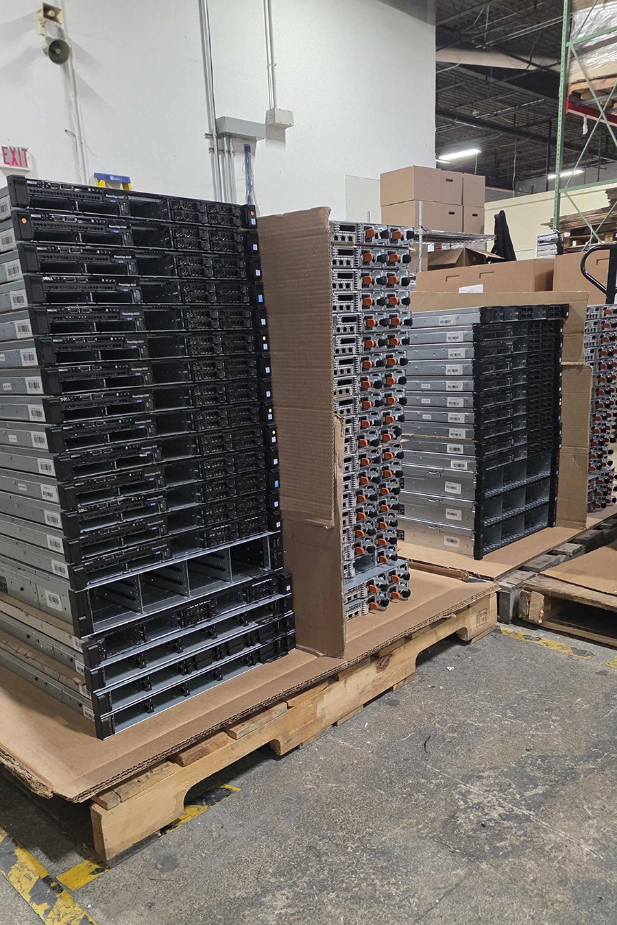 ITAMG facility featuring racks of decommissioned servers ready for processing